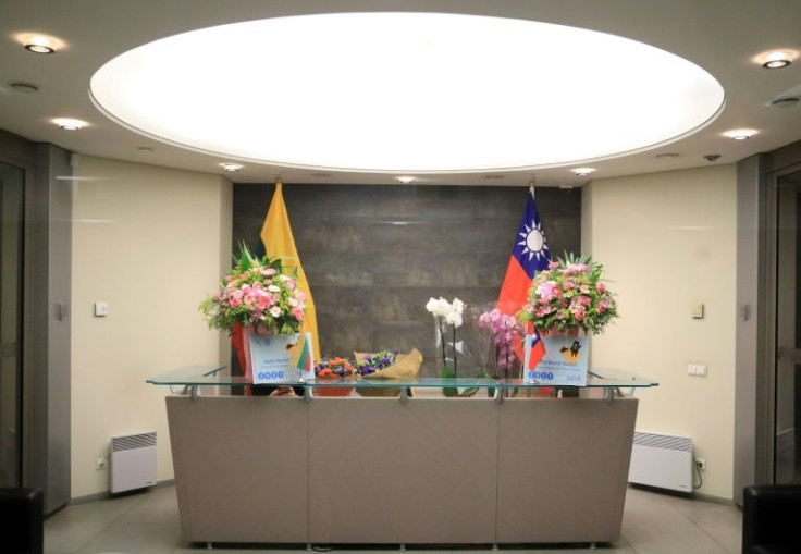 Flowers are seen in the lobby of the Taiwanese Representative Office in Lithuania, whose opening infuriated Beijing, in November 2021