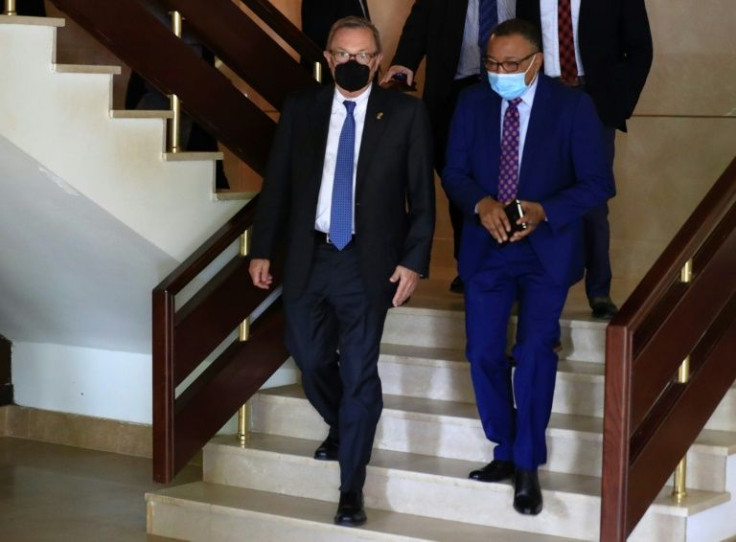 US Special Envoy for the Horn of Africa Jeffrey Feltman (L) leaves the office of the Sudanese prime minister in Khartoum on September 29, 2021