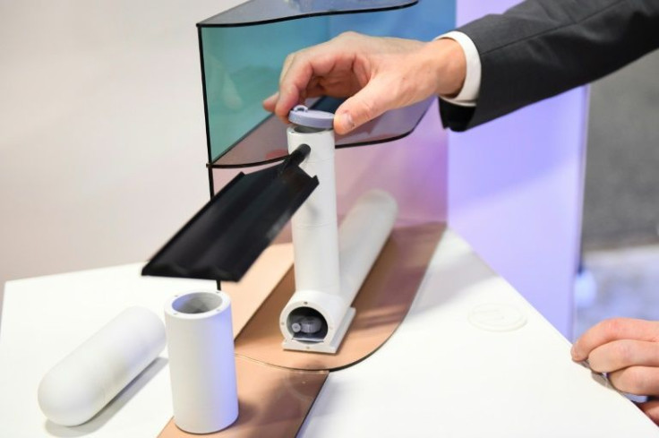 Frits Bliek, CEO of Dutch startup Ocean Grazer, explains an "ocean battery," during the Consumer Electronics Show (CES) on January 6, 2022 in Las Vegas