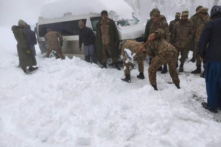 Cars had one-metre-high (three-foot) piles of snow on their roofs