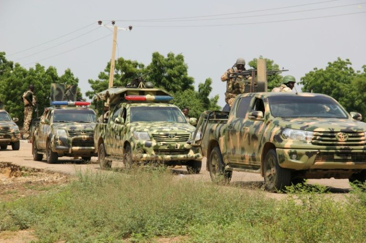 Security patrols like the one pictured here in Nigeria's northwest in October 2019 have failed to stem murderous attacks by gunmen