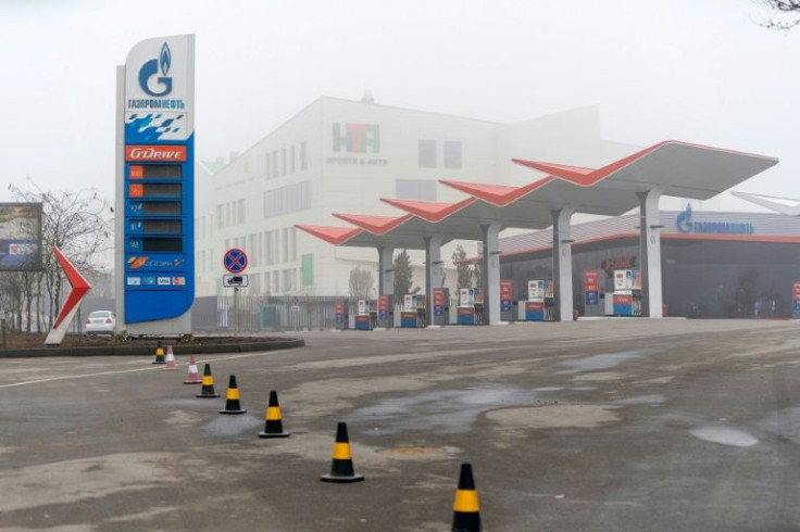 A closed petrol station in Almaty. Dozens of people have been killed in unrest sparked by fuel price rises