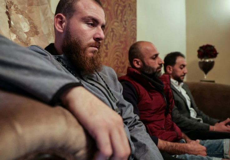 Lebanese would-be migrants Ahmad Merkabwi (L), 30, Abdallah Sobba (C), 36, and Abdelrahman Kilo (R), 37, talk about their failed effort