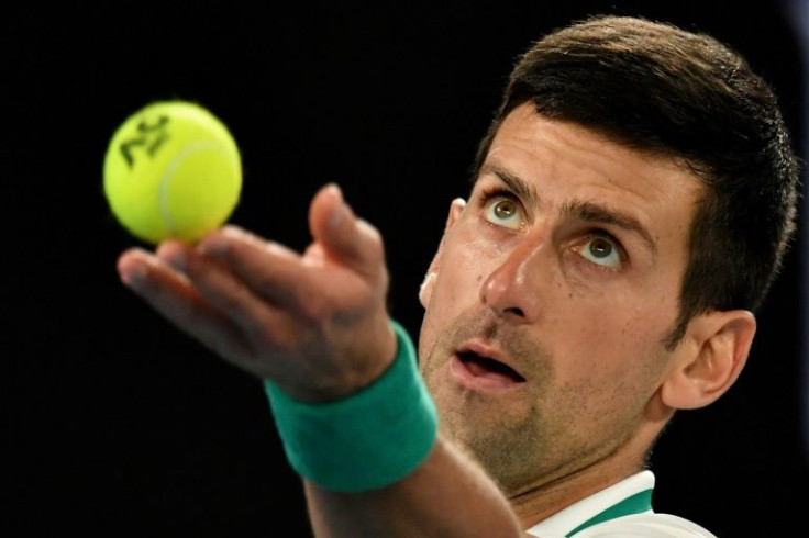 Novak Djokovic says he is determined to stay in Melbourne and compete in the Australian Open