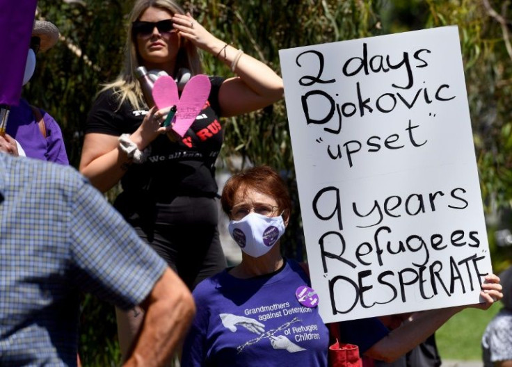 Dozens of journalists and scores of Djokovic fans, anti-vaccination mandate protesters and migrant rights activists rallied outside his Melbourne detention centre daily
