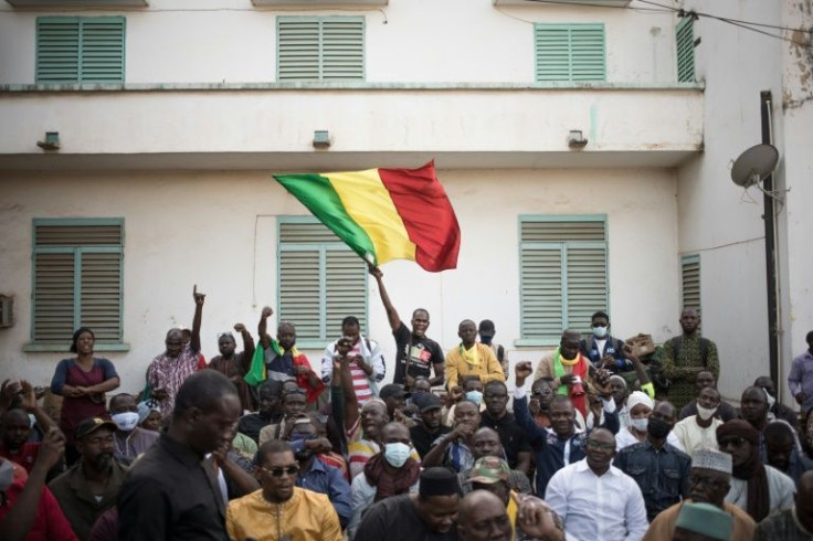 People in Bamako protest against newly imposed sanctions against Mali over the junta's delaying of promised elections