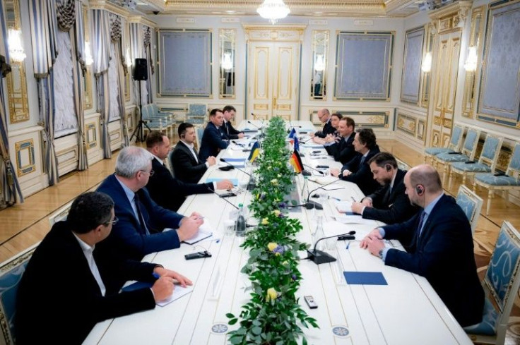 Ukrainian President Volodymyr Zelensky (4thL) met with the German chancellor's foreign and security policy adviser Jens Ploetner (3rdR) and the French president's diplomatic adviser Emmanuel Bonn (4thR) in Kyiv, Ukraine on January 11, 2022