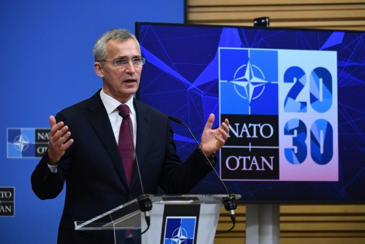 NATO Secretary General Jens Stoltenberg gave a press conference with the Ukrainian foreign minister after their bilateral meeting at the European Union headquarters in Brussels on December 16, 2021