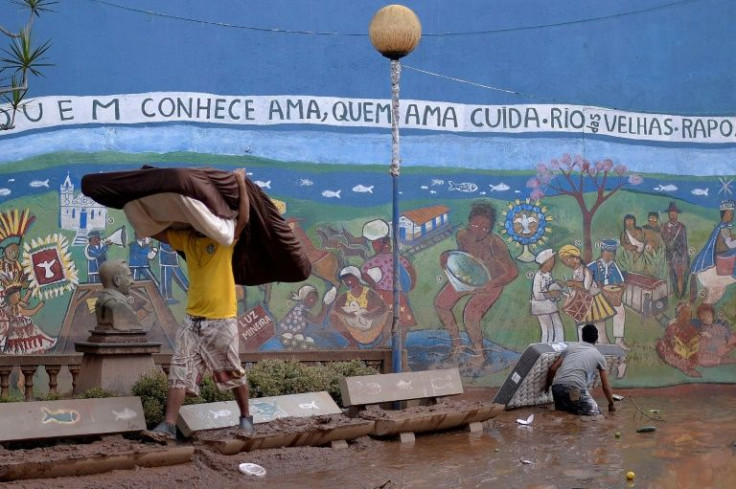 A flooded street in Raposos, Mina Gerais state, Brazil -- 19 people have died in the southeastern state since torrential rains began at the beginning of October 2021