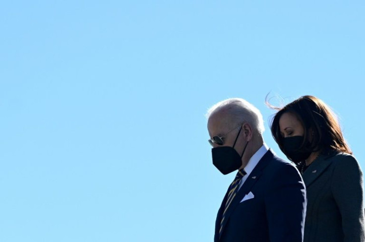 US President Joe Biden and Vice President Kamala Harris disembark from Air Force One upon arrival in Atlanta on January 11, 2022