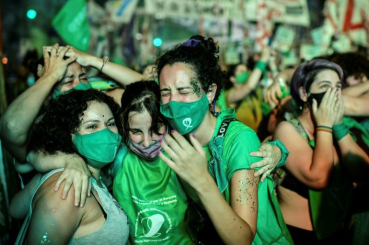 Pro-choice activists celebrate in December 2020 after Argentina's senate approved a bill to legalize abortion