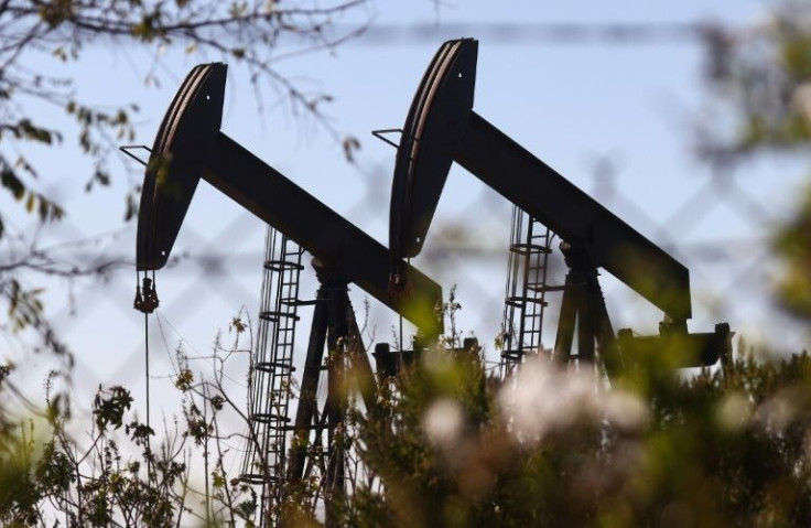 Oil prices extended Tuesday's rally after Energy Information Administration ramped up its 2022 projection by $5 a barrel