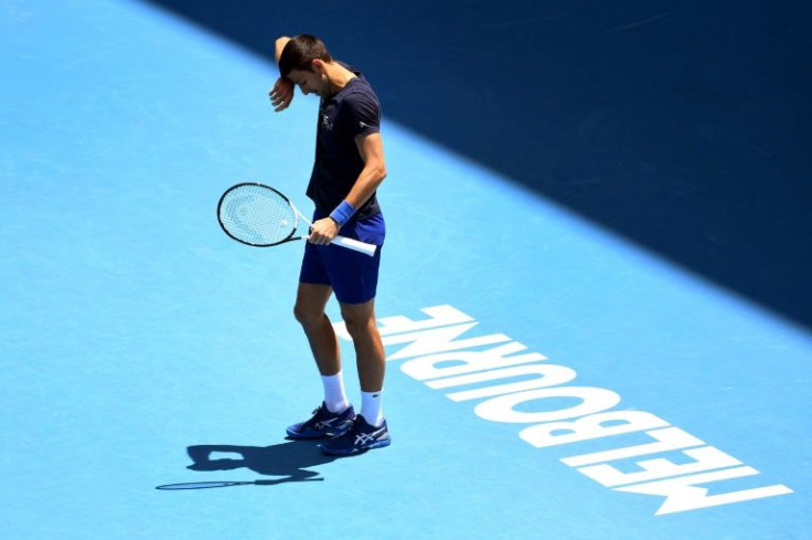 Novak Djokovic is battling to stay in Australia and fight for a record 21st Grand Slam
