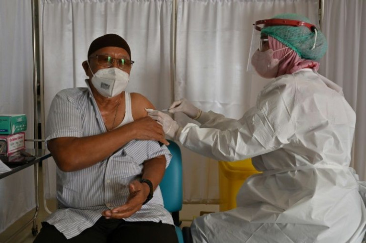 The boosters will be administered as half doses -- which a local study confirmed was sufficient protection against the virus -- due to supply shortages