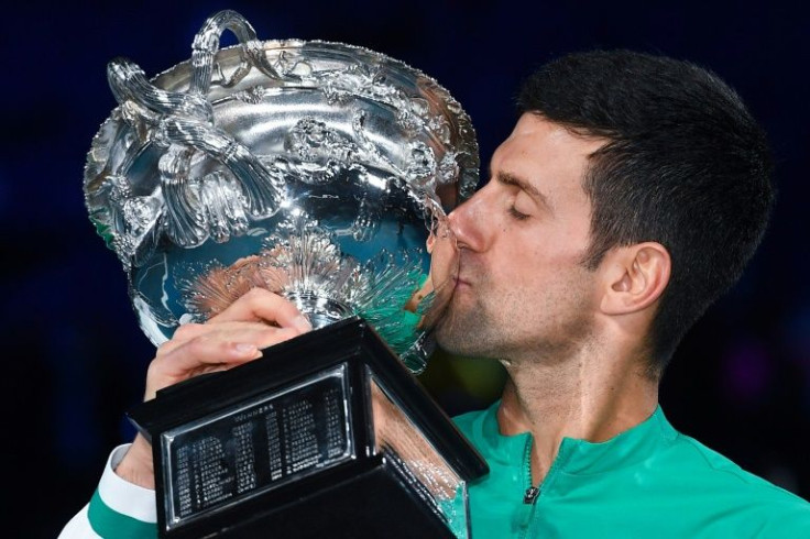 Novak Djokovic is chasing a record 21st Grand Slam but his place at the Australian Open is in peril