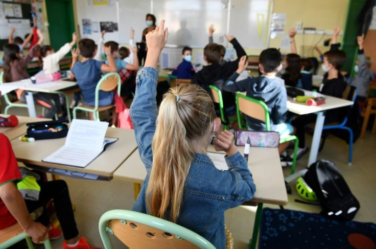 Half of French schools could close Thursday as up to three-quarters of teachers walk out, pushing back against the government after three changes of Covid rules for classrooms in one week