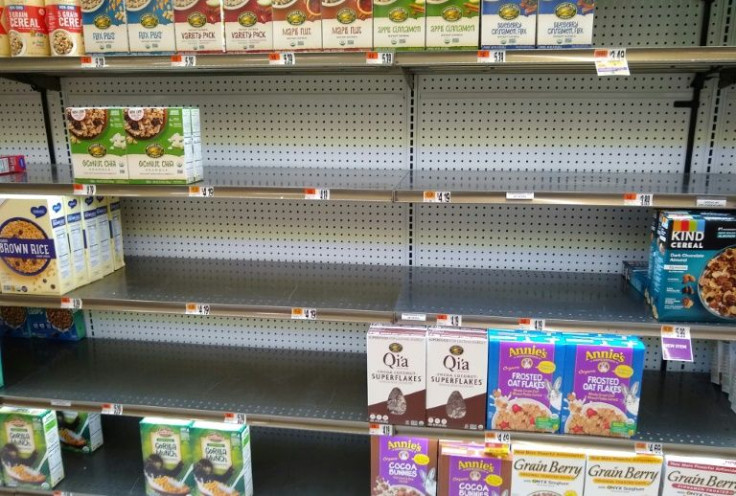 Empty shelves are pictured at a Giant grocery store in Bethesda, Maryland on January 13, 2021, a consequence of both the Omicron variant and a recent snow storm
