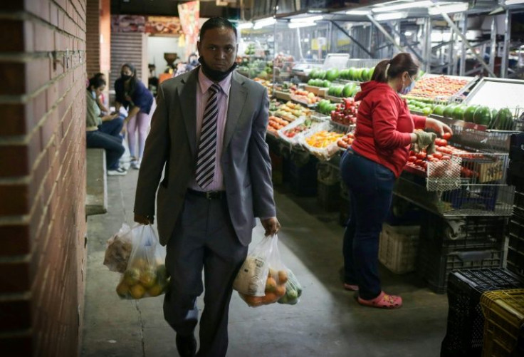 Shoppers at the Chacao market in Caracas complain that prices seem to rise every day