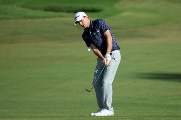 American Russell Henley plays his approach at the 16th hole on the way to the early second-round lead inthe US PGA Tour Sony Open in Hawaii