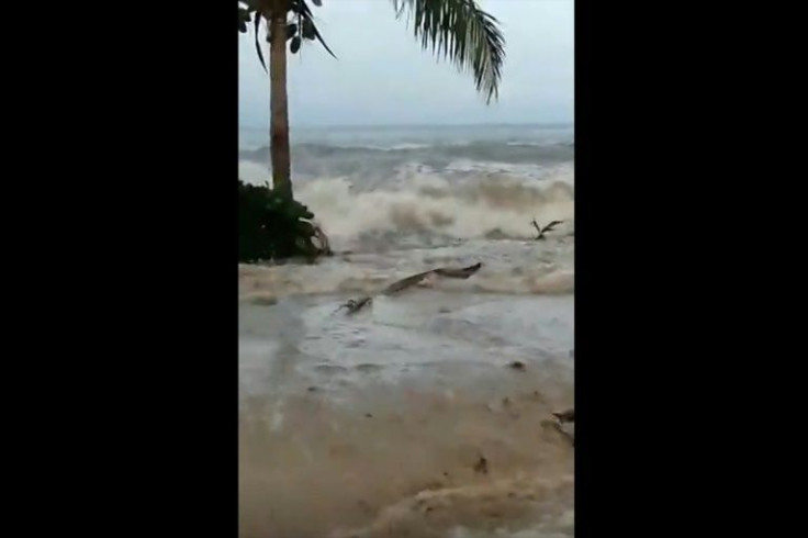 Large waves hit the coast of Suva City in Fiji after an undersea volcanic eruption sparked a new tsunami warning in Tonga