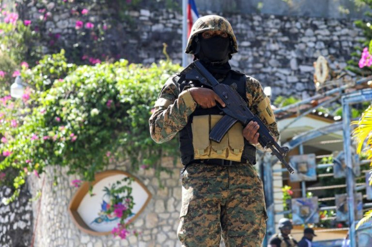 Haitian police officers stood guard outside of presidential residence in Port-au-Prince, Haiti, after President Jovenel Moise was assassinated on July 7, 2021