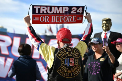 Many Donald Trump supporters who gathered for a rally held by the former US president in Florence, Arizona carried signs proclaiming "Trump 2020" and "Trump 2024"