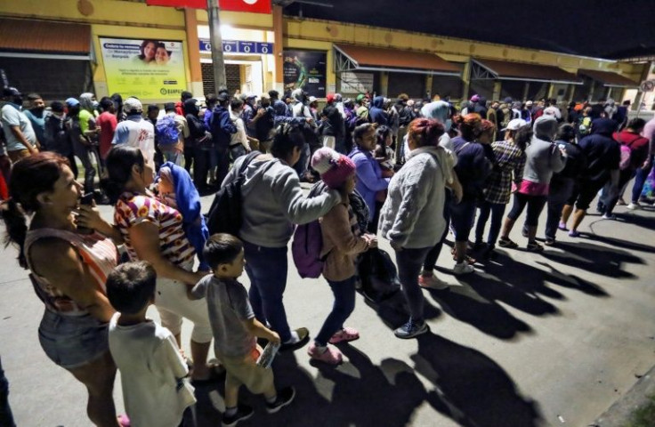A migrant caravan gathered in the parking lot of San Pedro Sula's main transit center, in the north of Honduras -- they hope to be able to reach the United States