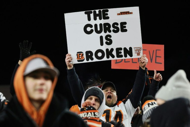 Cincinnati fans celebrate after the Bengals' 26-19 victory over the Los Vegas Raiders -- the team's first NFL playoff victory since January 1991