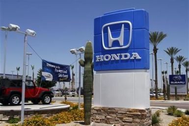 A Honda sign is displayed outside SanTan Honda Superstore in Chandler, Arizona