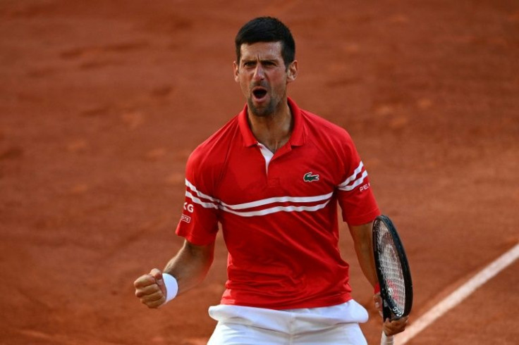 Grand Slam warrior: Novak Djokovic celebrates after beating Stefanos Tsitsipas in last year's French Open final