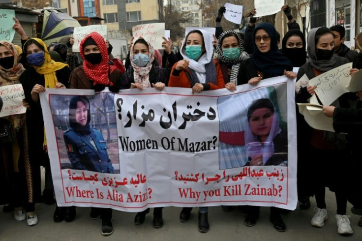 Around 20 women gathered in front of Kabul university