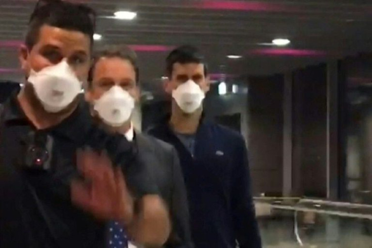 Djokovic boarded a flight from Melbourne's Tullamarine airport for Dubai late Sunday