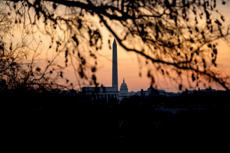 The Lincoln Memorial, Washington Monument, and US Capitol at sunrise in Washington, DC, on January 16, 2022, ahead of a winter storm