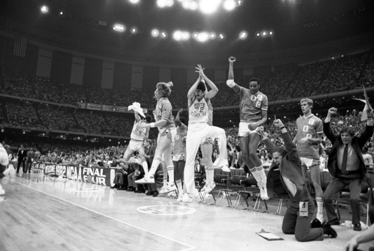 The North Carolina bench erupts with joy with 15 seconds to go as a jump shot by Carolina's Michael Jordan gives the Tar Heels a 63-62 victory over Georgetown in the NCAA Championship game.