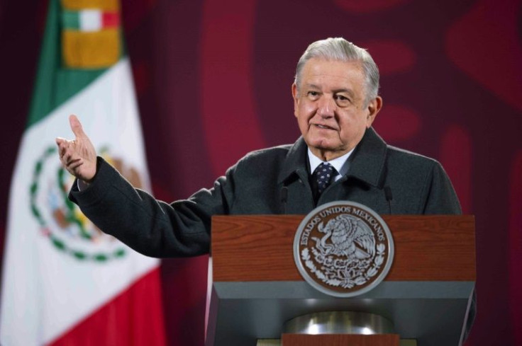 Mexican President Andres Manuel Lopez Obrador speaks to reporters at the National Palace as he resumes his public activities after a second bout of Covid-19