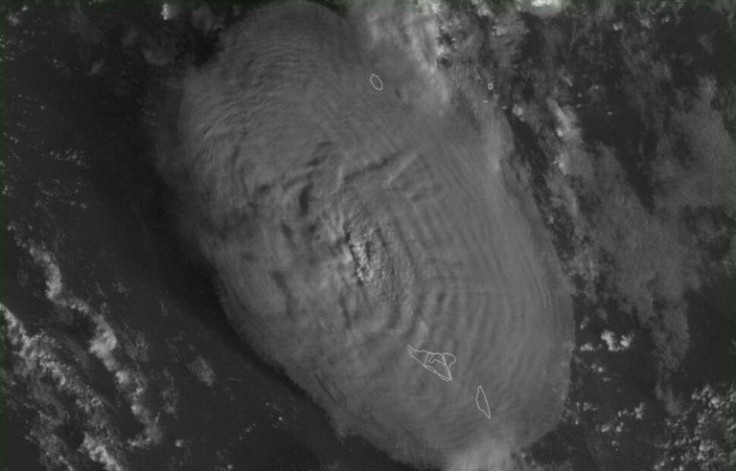 A screen grab taken from a US weather satellite on January 15, 2022 shows the volcanic eruption that triggered a tsunami in Tonga