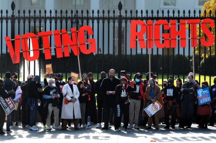 Demonstrators demanding voting rights protest in front of the White House