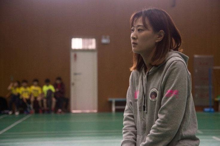 Badminton teacher Jiang Yujing was a member of China's winning squad in the 2010 World Junior Championships