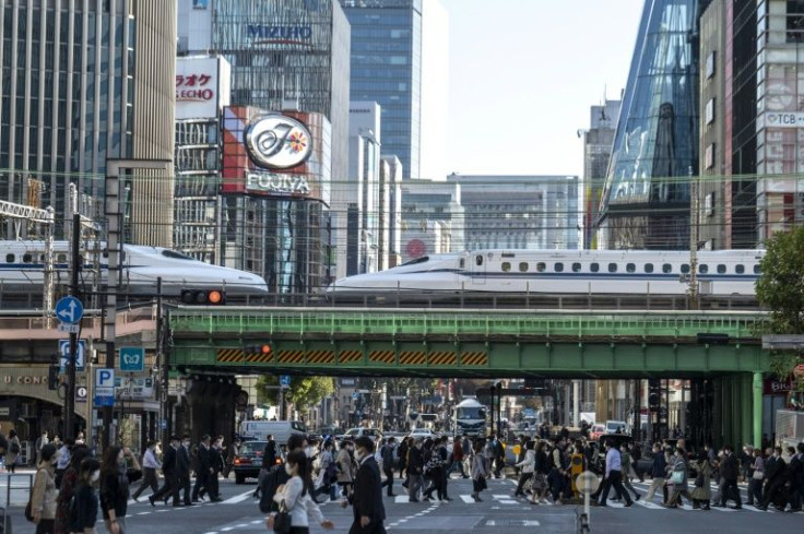 Japan's central bank has revised up its inflation forecast