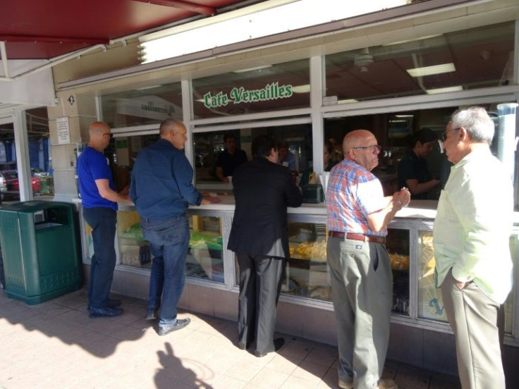 Customers gather at Miami's Cafe Versailles, a Cuban eaterie, in 2016