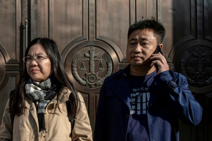 Xie Yang (right) -- who has previously defended Christians and democracy activists -- has not been heard from since he was detained