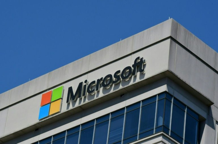 In this file photo taken on May 20, 2021, a Microsoft logo adorns a building in Chevy Chase, Maryland