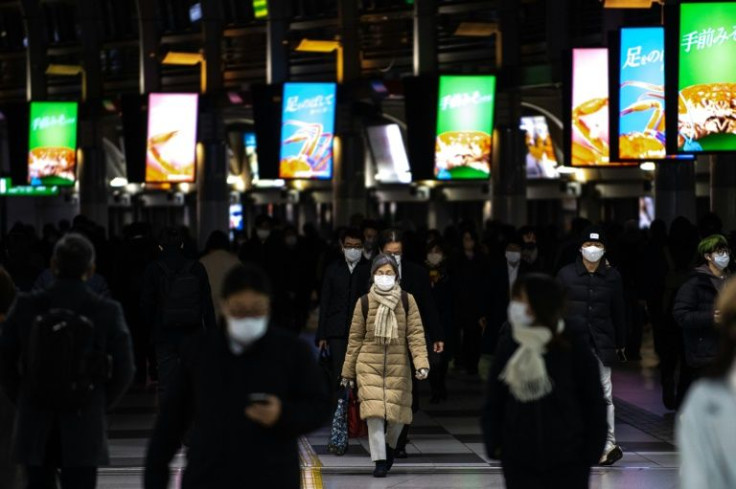 Japan will approve new virus rules in the capital and other regions over surging Covid infections