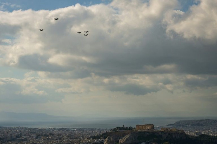 The six warplanes landed at Tanagra air base after overflying the Acropolis, escorted by Greek Mirage jets previously purchased from France