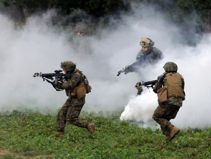 US servicemen take part in a military drill near Yavoriv, western Ukraine, in 2015. The threat of a Russian invasion of Ukraine puts at risk the US military training mission in the country.