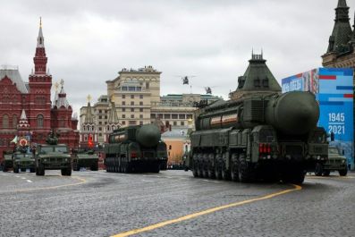 Russian Yars RS-24 intercontinental ballistic missile systems move through Red Square during the Victory Day military parade in Moscow on May 9, 2021