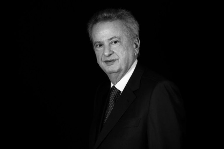 Lebanon's Central Bank Governor Riad Salameh, posing during a studio photo session in the capital Beirut, is under investigation for suspected financial crimes which he denies