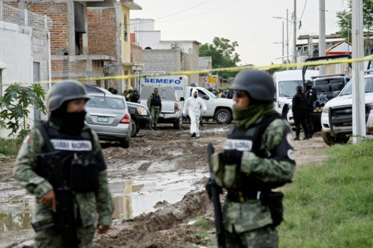 Members of Mexico's National Guard deploy near a crime scene in Irapuato in the central state of Guanajuato