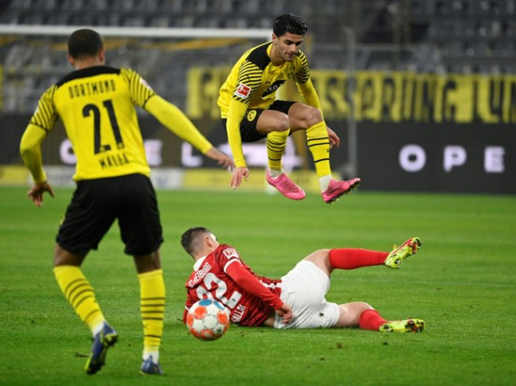 Dortmund midfielder Mahmoud Dahoud (top) was oustanding in the win over Freiburg