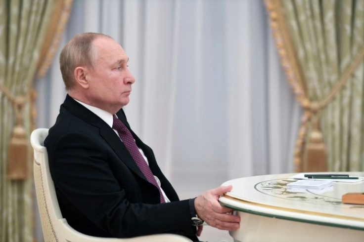 Russian President Vladimir Putin looks on during a meeting with Iranian President in Moscow on January 19, 2022.